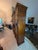 Offered is a stately, commercial-grade vintage china cabinet/display case custom-manufactured by the renowned John...