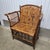 Authentic vintage bamboo lounge armchair crafted from real bamboo with an architectural arched back, open spindle sides,...