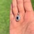 Radiant Emerald-Cut Deep Blue Sapphire & Diamond Halo Pendant in 14k Gold For Sale In New York - Image 6 of 14