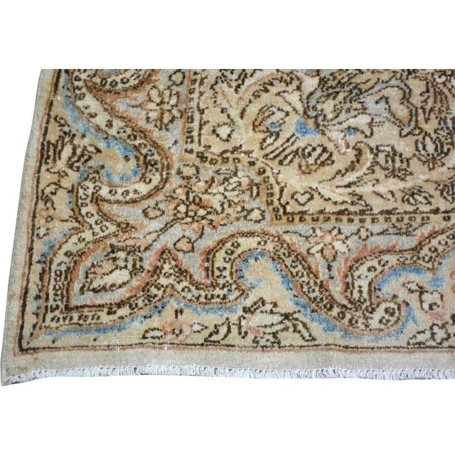Hand-knotted with care using traditional rug-making techniques, this wool rug blends timeless craftsmanship with a modern...