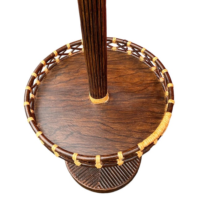 This is an offering for an organic modern pencil bamboo bentwood floor lamp. There are two available. The wring is...