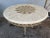 I'm very pleased to offer for sale this gorgeous large round French-style (dining/garden) table made by the highly...