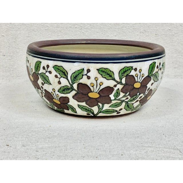 Wonderful vintage hand-painted Cachepot. Features a vibrant floral design. Perfect to use as a decorative bowl or...