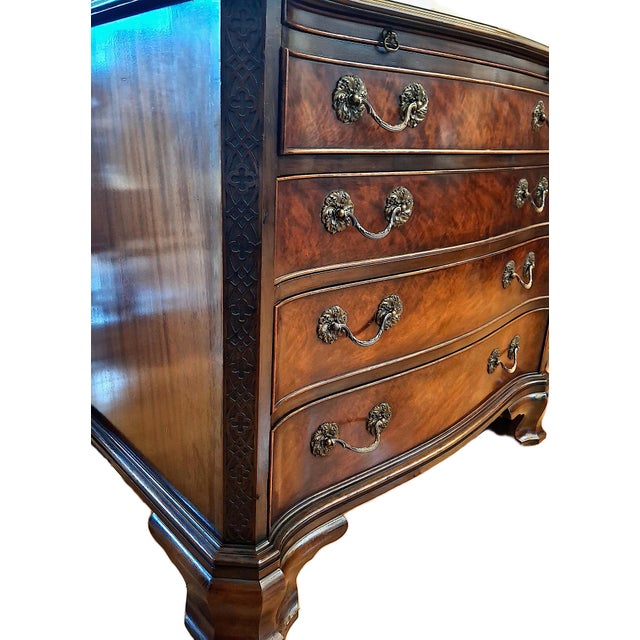 This early 20th-century mahogany chest of drawers is a fine example of the George III style, a period design noted for its...