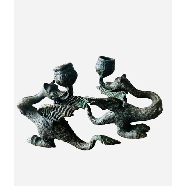 An antique Neo-Gothic bronze dragon candlestick holder, from the early 19th century, exudes a timeless allure with its...