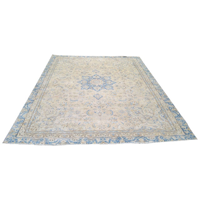 Hand-knotted with care using traditional rug making techniques, this wool rug blends timeless craftsmanship with a modern...