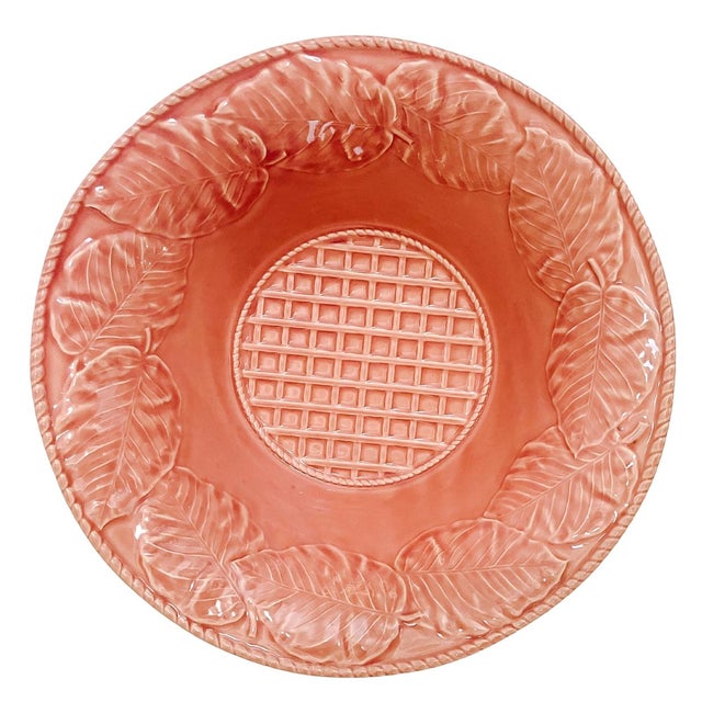 Embossed large leaves and basketweave make up the design of this large 12" salad serving bowl by Bordallo Pinheiro. It is...
