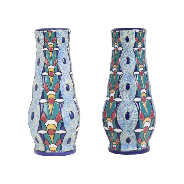 A stunning pair of enameled Art Deco vases produced by the world-renowned Amphora factory in Teplice, Czech Republic; this...