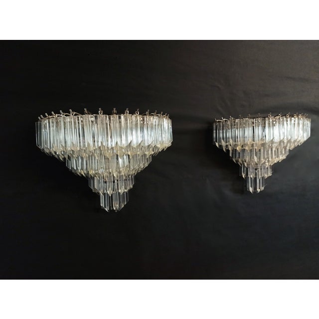 Fantastic pair of vintage Murano wall sconce made by 63 Murano crystal prism (quadriedri) for each applique in a chrome...