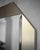 The octagon-shaped mirror comes from Italy. It has a frame made of brushed brass (which is less golden than traditional...