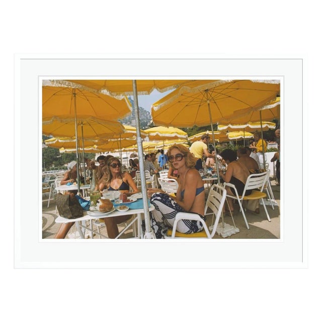 Contemporary Cafe in Monte Carlo 1975 by Slim Aarons White Framed C-Print For Sale