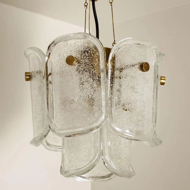 Glashütte limburg gußkristall pendant lamp by glashütte limburg made of polished brass rod and tubes. Nine curved cast...