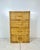Vintage wrapped rattan tall dresser. Woven caning wrapped tall chest of drawers. Bamboo rattan handles. Finished back can...