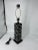 Vintage black domino motif table lamp with harp and matching domino finial.