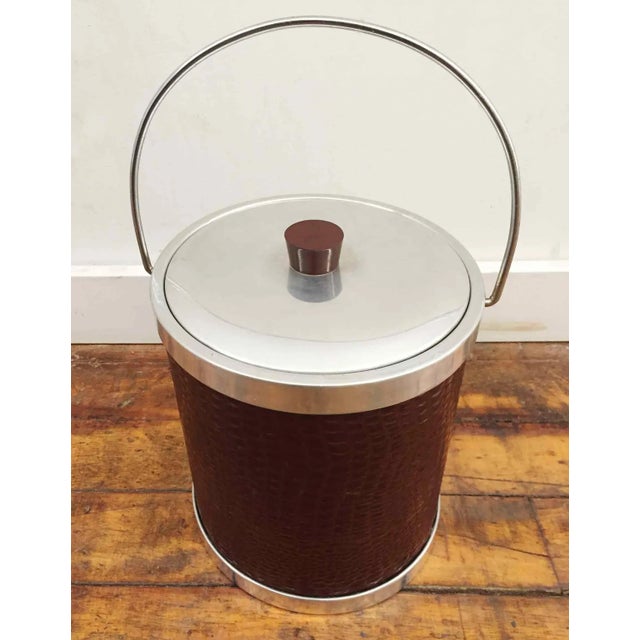 Italian, vintage ice bucket with embossed alligator style finish. Aluminum lined.
