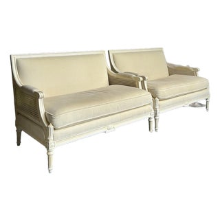Vintage Regency Upholstered Cane Settee - A Pair For Sale