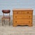 This is a nice old maple chest of drawers that is unsigned but likely made in the United States in the early 20th century....