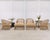 A stylish weathered set of eight mid-20th century patio and garden armchairs and ottomans designed by Danny Ho Fong for...