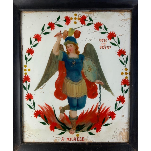 This beautifully executed reverse painted glass image depicts "S. Michele". Saint Michael is an Archangel in many...