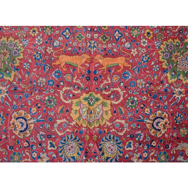 A wonderful and whimsical early 20th century Indian Agra rug with an all-over pattern of large-scale flowers and scrolling...