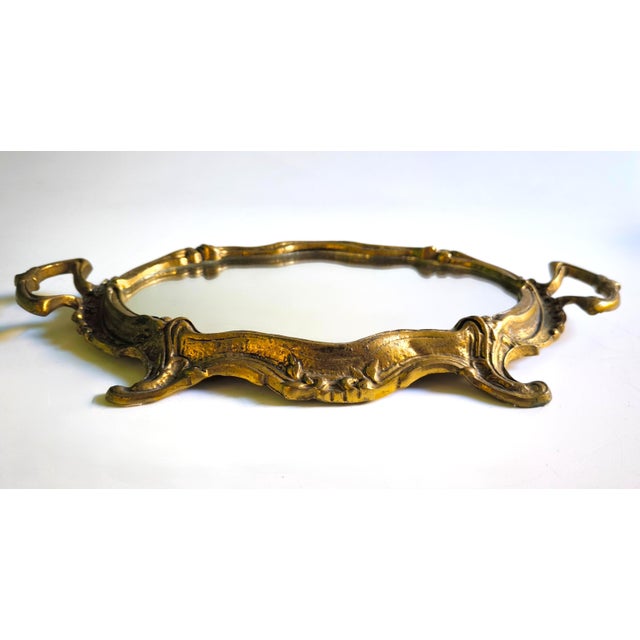 Exquisite French bronze tray with mirror, in the Louis XV style, from France, dating from the mid-20th century. The tray...