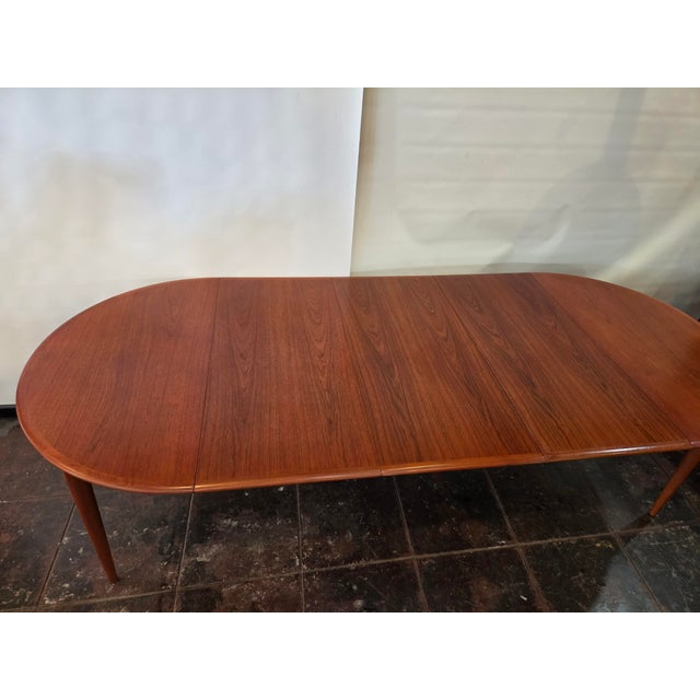 Mid- Century Danish Modern Teak Dining Table Round Opens Oval 105 Inches With 3 Leaves For Sale - Image 17 of 18