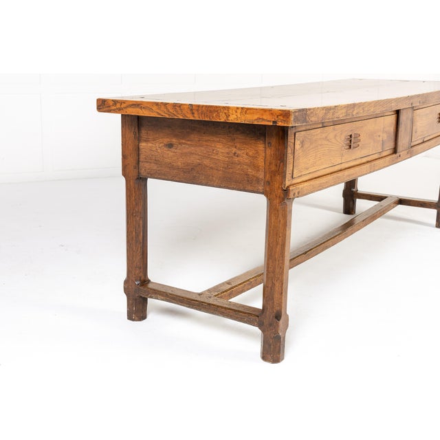 18th century french oak table an 18th century french oak table with plank top. the table is of rectangular form with an...