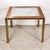 This is a very cool mid century modern square side table that features a brass parsons style frame and a removable glass...