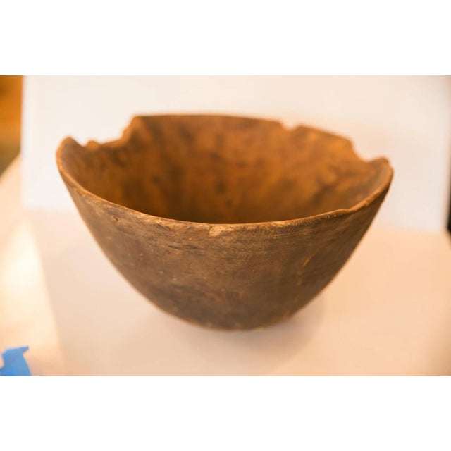 :: Vintage hand-carved primitive wooden bowl with tons of character and charm. Please note this is an aged and lived with...