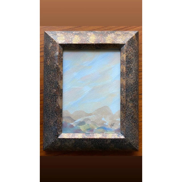 Watercolor painting by Cameron O'Neal, signed "O'N" lower right. Framed in a textured wide format frame and wired for wall...