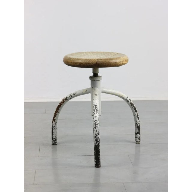 - Adjustable seat height: 45-65cm. - Seat diameter: 30cm. - Good vintage condition. - Packed with love and care.