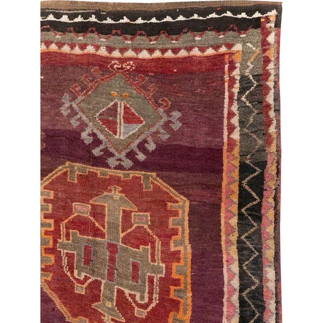 A vintage Turkish Anatolian small room size tribal carpet handmade during the mid-20th century. Measures: 8' 1" x 10' 6"