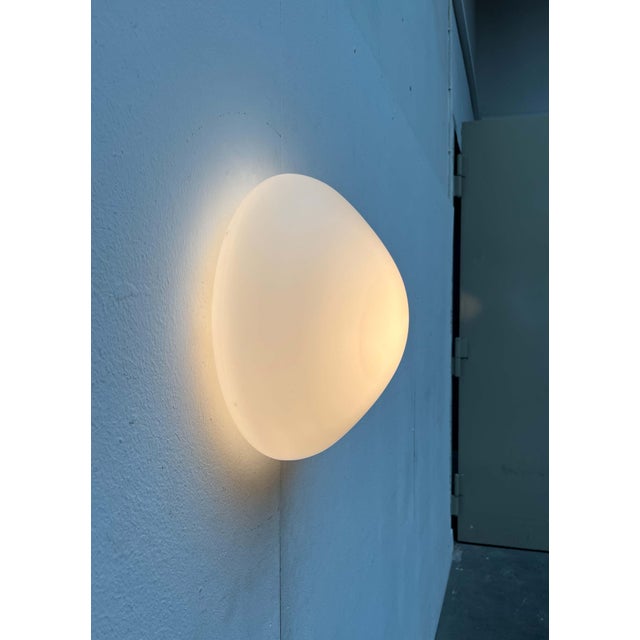 Classic ceiling and wall lights designed by Wilhelm Wagenfeld in the 1950s. This is a rare version with frosted glass and...