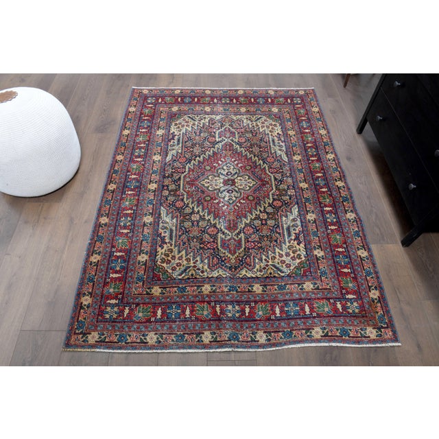 Vintage Hand-Knotted area rug is a semi-antique vintage area rug. The '70s Eastern region of Anatolian's unique rug is...