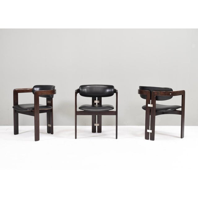 Introducing Pozzi's Pamplona Chairs by Augusto Savini - Italy, 1965. The chairs represent a harmonious blend of Italian...