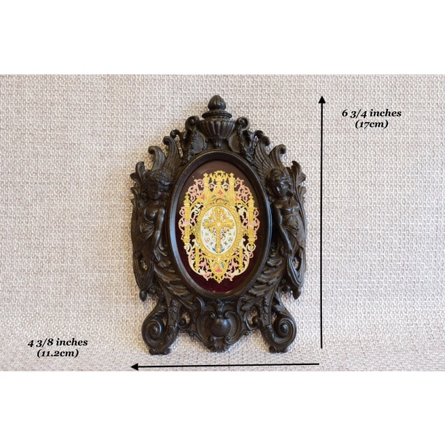 A beautiful and rare French antique photo frame dating back to the late 19th century, featuring an ornate Victorian design...