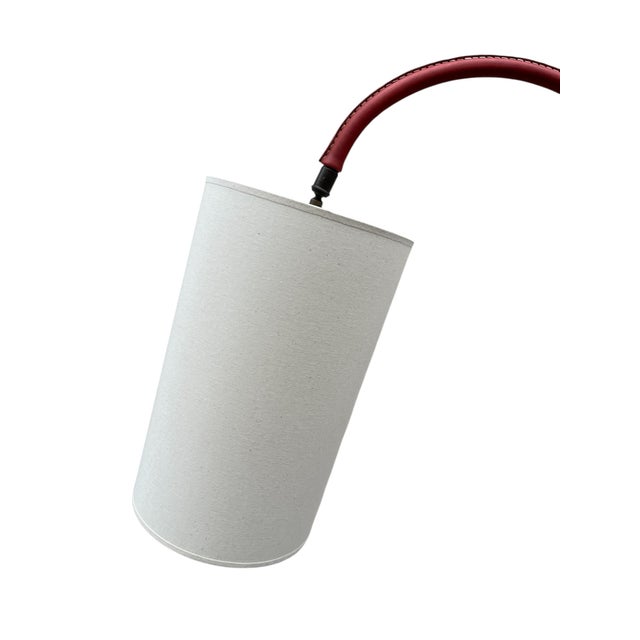 Leather-Covered Floor Lamp by Jacques Adnet, 1950s, in Very Good conditions. Designed 1950 to 1959 This piece has an...