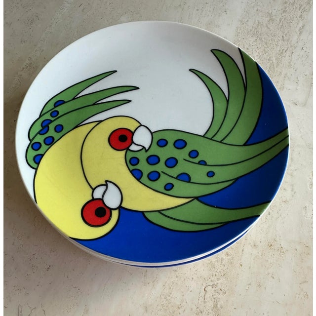 Set of four Fitz and Floyd Parrot Plates - approximately 7 1/4 inches in diameter in very good vintage condition.