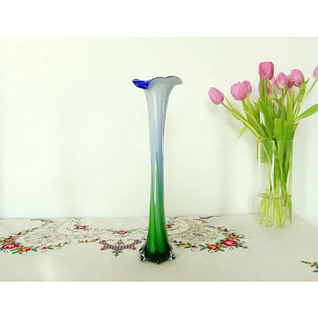 Calla is a stunning Murano vase realised by expert glass blowers in Venezia in the mid 70s. This one of a kind piece shows...