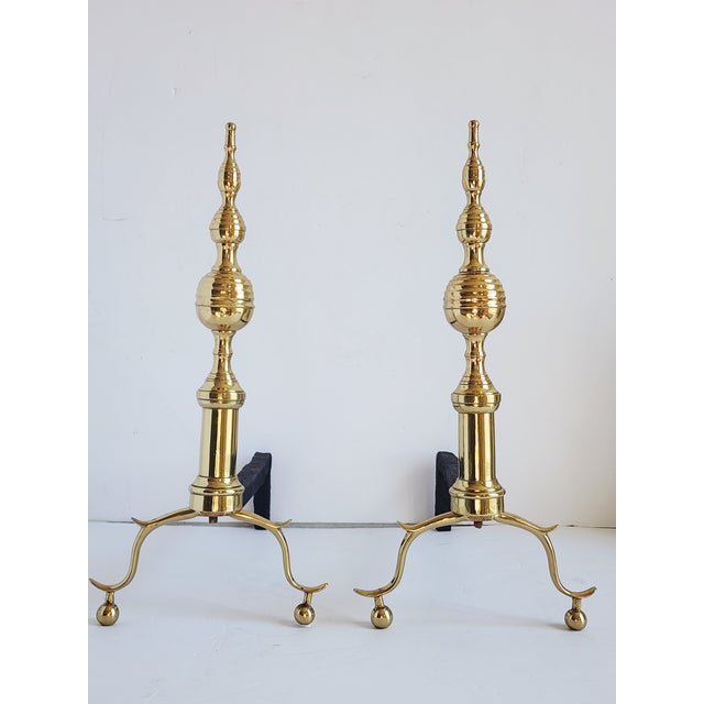 Fine pair of antique late 18th century steeple top spur legs brass andirons, with ball feet. Originally designed by...