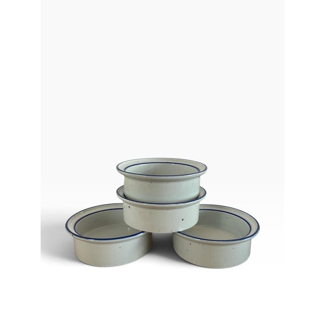 Matching set of four (4) vintage rim soup bowls in the iconic "Blue Mist" pattern by Dansk. Designed by the acclaimed...