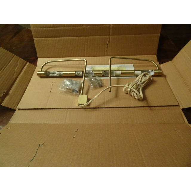 House of Troy Advent 21" wide picture lights. Satin Nickel, most are new and unopened in original packaging. Purchased for...