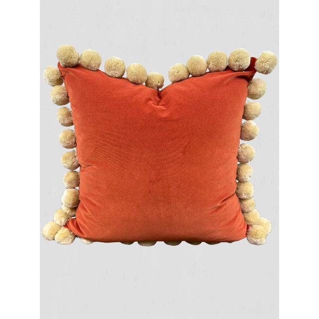 We are loving this beautiful custom made pillow pair in orange velvet. Extra large ivory pom poms. Hidden zipper closures....