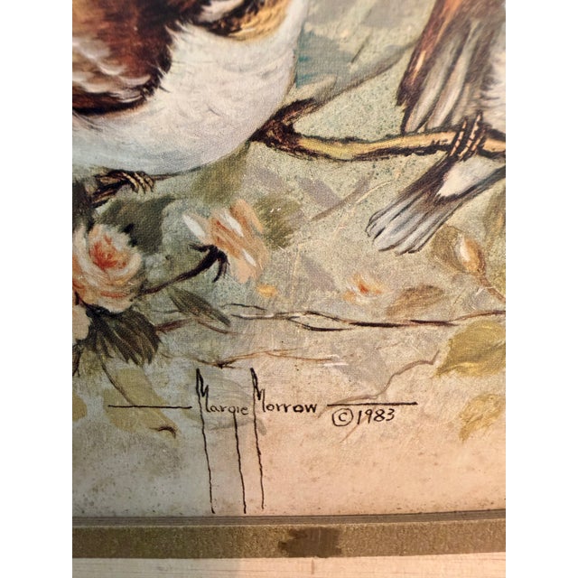 Bring warmth and charm to your home with this vintage framed bird print by Marjorie Morrow, dated 1983. The artwork...