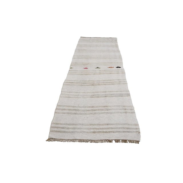 Handwoven vintage hemp kilim rug from Yozgat region of Turkey. Approximately 45-55 years old. In very good condition.