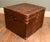 Handsome vintage leather travelling trunk designed in the traditional steamer and campaign luggage style The substantial...