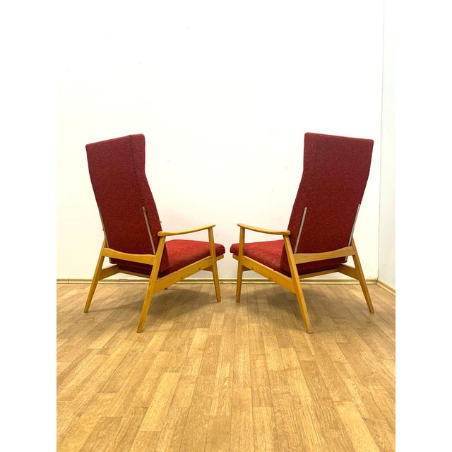 A pair of stylish and timeless retro armchairs produced by ton in czechoslovakia during the 1960s. These iconic pieces...