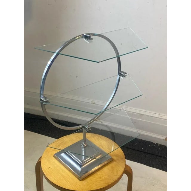 Modernist Art Deco Chrome Circle Display Shelves With Three Angled Glass Shelves Designed In The 1930's.The Base Measures...