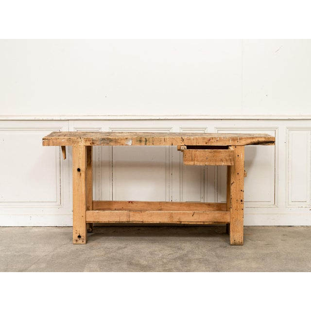 Charming little antique beechwood workbench, retaining a beautiful original patina directly linked to its former use. Its...