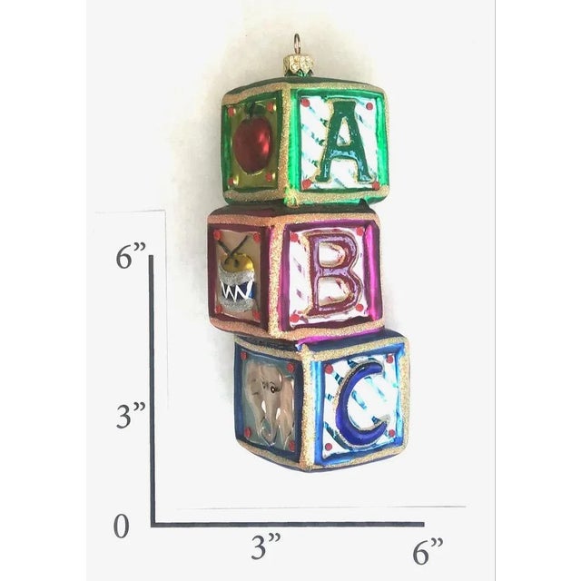 Rare vintage 1990's Christopher Radko "A,B, C's" ornament. Blown glass with a pearlescent finish with glitter. Brightly...